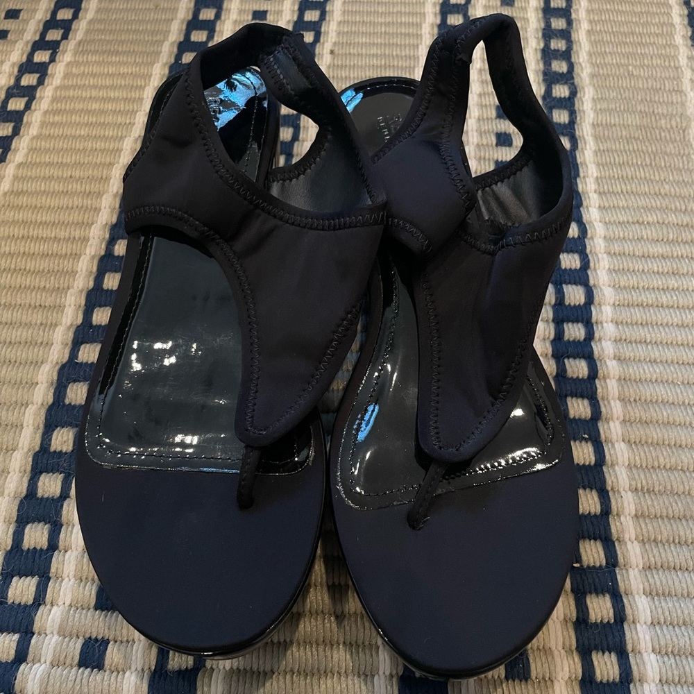 Kenneth Cole black sling back sandals.